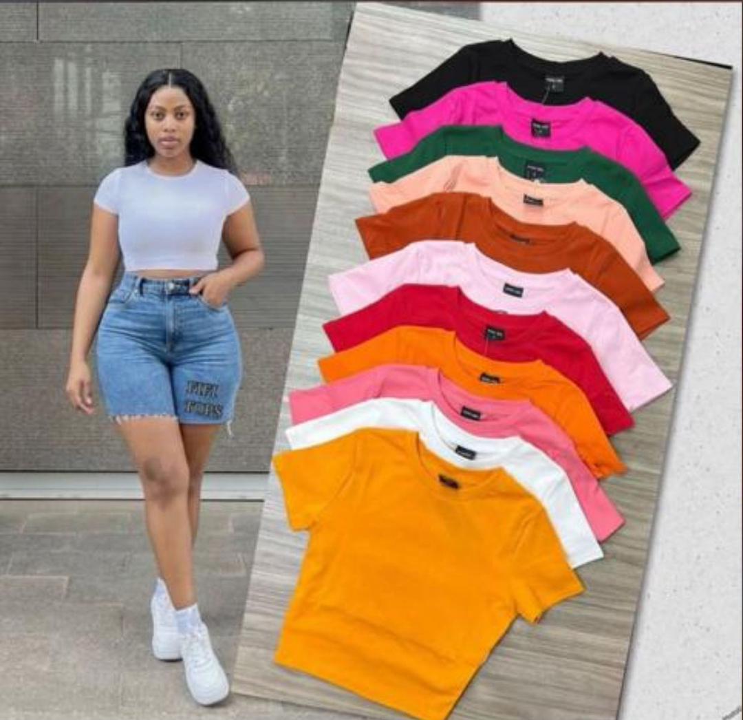 •	Nike noir .Robe femme wax rouge