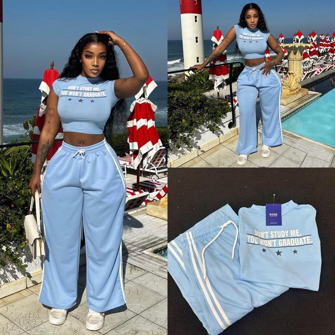 •	Nike noir .Robe femme wax rouge